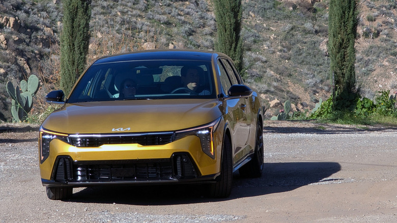 2026 Kia K4 Hatchback GT-Line Turbo by Stephen Rivers for Carscoops 39
