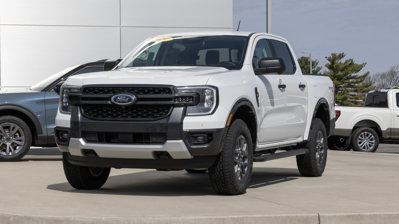 A front-three quarter view of a white 2025 Ford Ranger