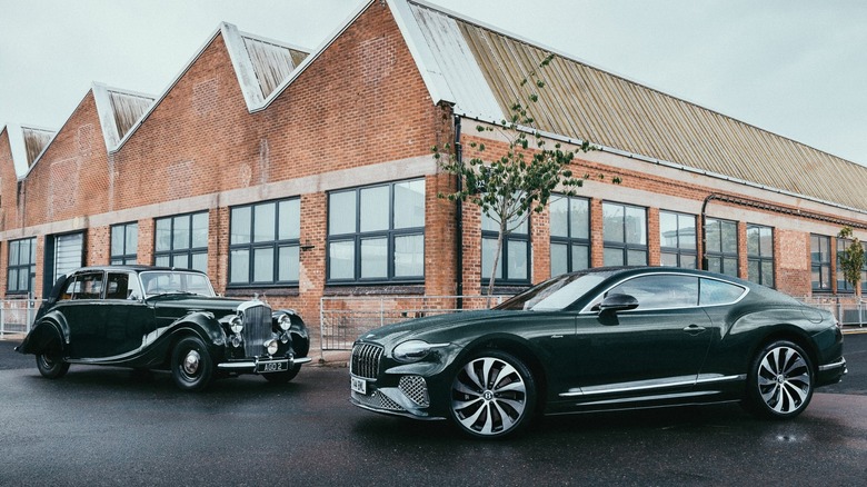 Old and new Bentley models parked outside the Crewe plant