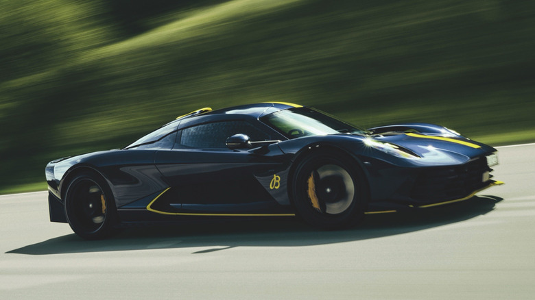 A front three-quarter tracking shot of an Aston Martin Valhalla supercar