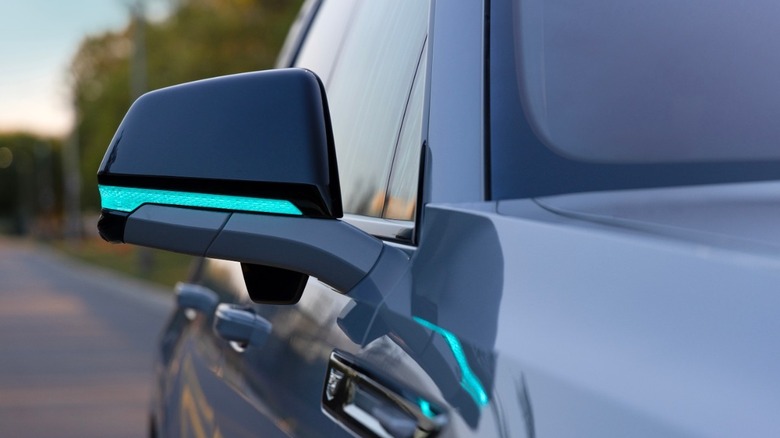 Close-up of a mirror of an autonomous Cadillac Escalade IQ