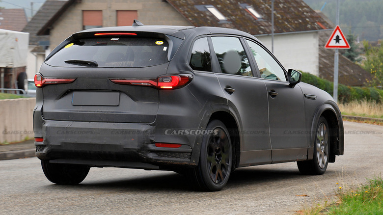 Spy shot of a Mazda EV mule based on the CX-90