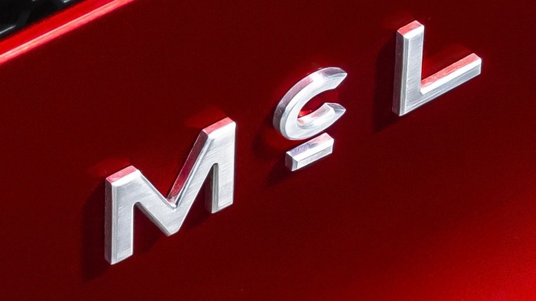 Close up of a badge from a McLaren McL 6GT supercar