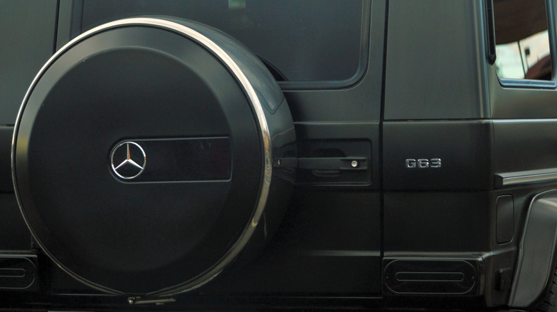Rear shot of a Mercedes Benz G63 focused on the spare wheel cover