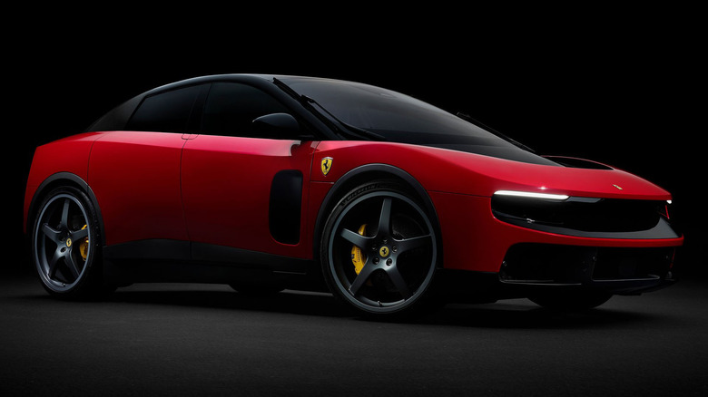 A red Ferrari Luce against a dark background