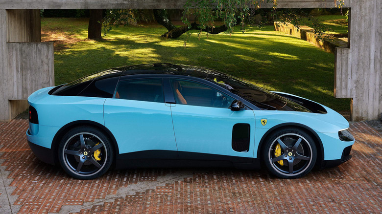 A blue Ferrari Luce shown from the side profile