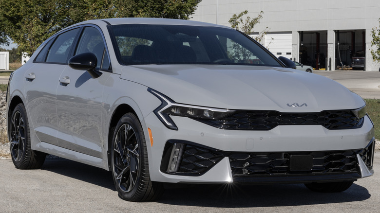 A grey 2026 Kia K5 parked