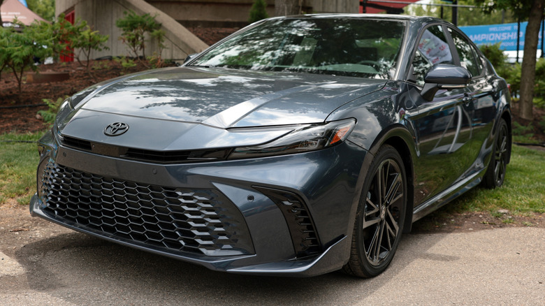 Front three-quarter of a grey 2026 Toyota Camry