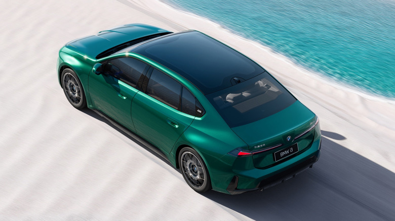 A green BMW i3L electric sedan from China