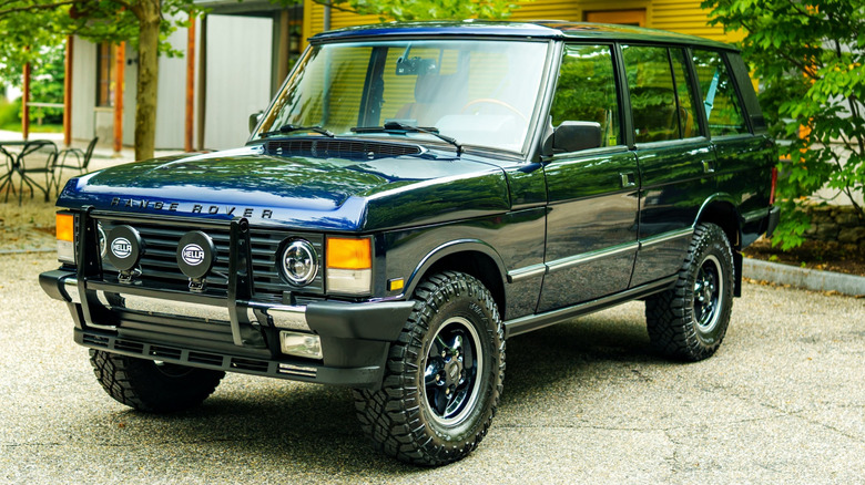 A front view of the dark blue Range Rover Classic from Legacy Overland