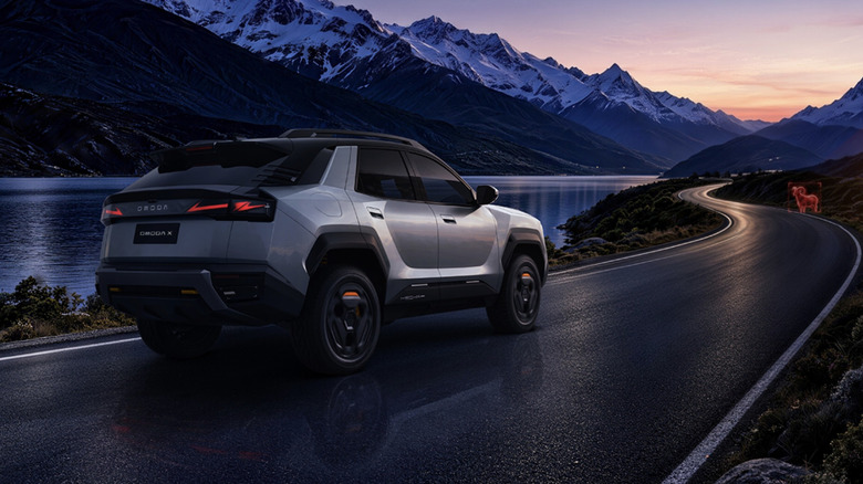 The Omoda X driving next to a lake, with the infrared system detecting a wild animal.