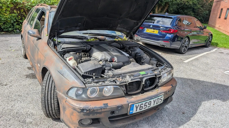 An E39 BMW 540i Touring M Sport with a fake patina effect on the bodywork.