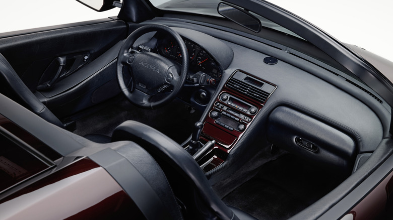 The interior of the Acura NSX Roadster is sourced from the first generation NSX.
