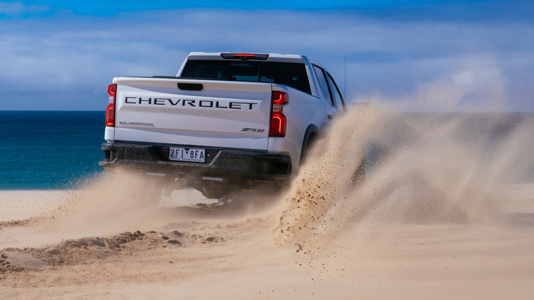 A Chevrolet Silverado ZR2 being driven on the beach