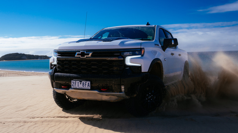 A Chevrolet Silverado ZR2 drifting on the beach