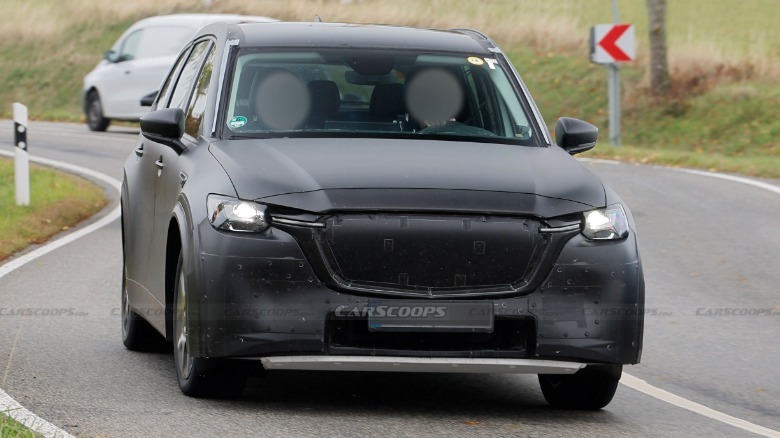 Spy shot of a Mazda EV mule based on the CX-90