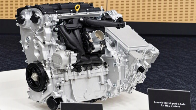 Toyota 1.5 hybrid engine on a display stand