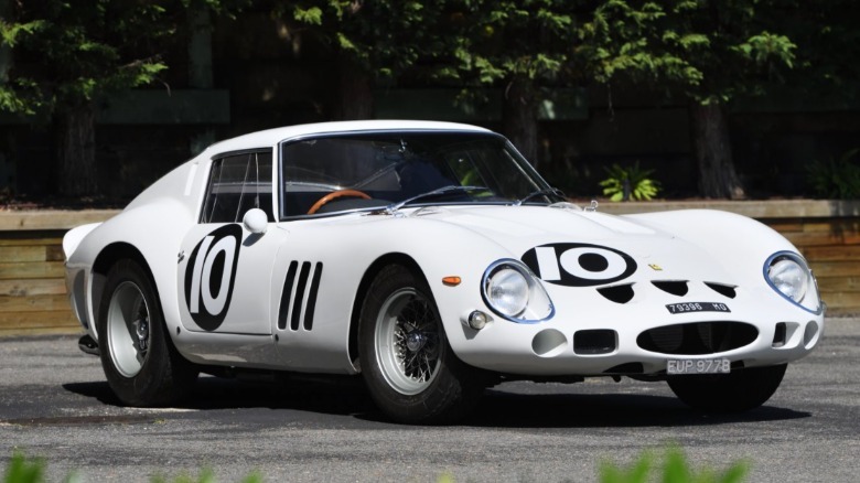 A white Ferrari 250 GTO sold by Mecum