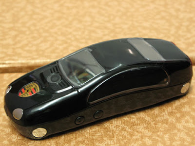  Porsche Cayenne Cell-phone:  Made in China of course…