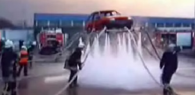  Firefighters Lift Car Up In The Air With Water Hose