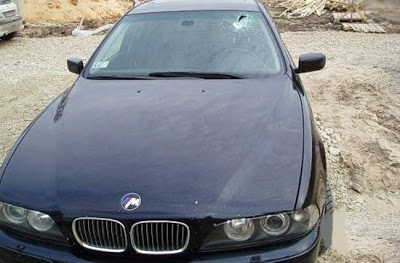  Flying Piece Of Metal Penetrates BMW Missing Driver’s Head By Inches