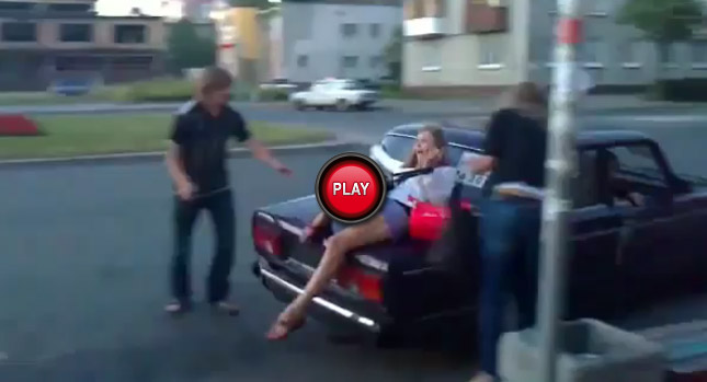  Bummer: Sitting on the Trunk of a Car that’s About to Leave is a Very Bad Idea [Video]