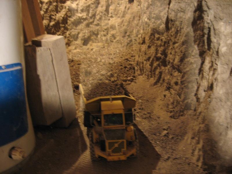 Canadian Digs Out Basement Using Only Radio Controlled Scale Tractors And Trucks