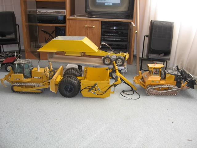 Canadian Digs Out Basement Using Only Radio Controlled Scale Tractors And Trucks