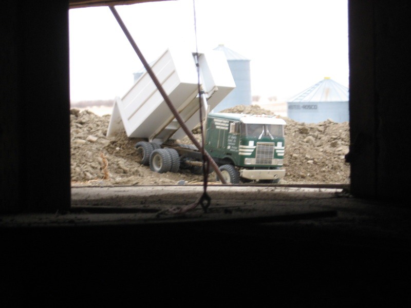 Canadian Digs Out Basement Using Only Radio Controlled Scale Tractors And Trucks