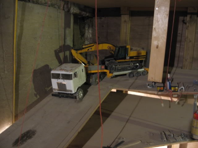 Canadian Digs Out Basement Using Only Radio Controlled Scale Tractors And Trucks