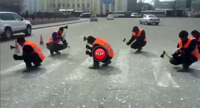  Meanwhile in Russia, Workers Try to Remove Zebra Stripes on Crosswalk