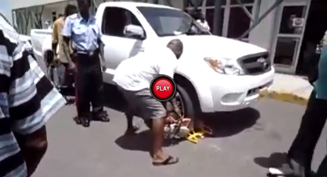  Angry Driver Takes Care of Wheel Boot Problem with a…Circular Saw