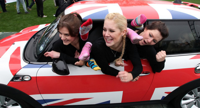  Extremely Flexible Gals Set New World Records for the Most People Crammed Inside a MINI