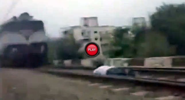  Nincompoop Jumps Under a Speeding Train, Makes it Out Alive