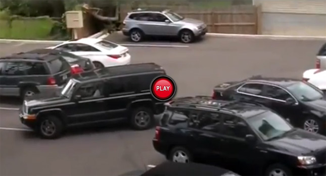  Jeep Driver is Having an Unexplainable Hard Time Backing Out of This Parking Spot