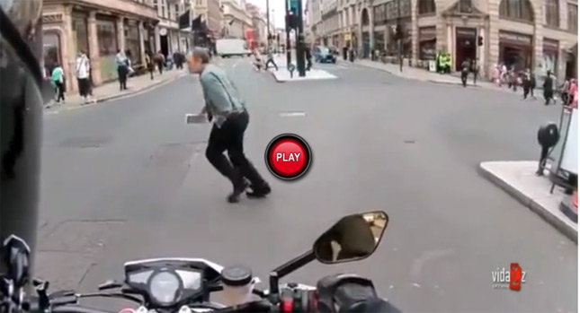  Watch a Motorcyclist Scaring and Surprising People with Load Exhaust