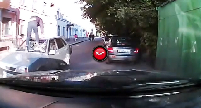  Angry Russian Thinks Moving Car's Windscreen is a Soccer Ball
