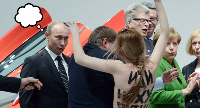  Oh, My…Topless Female Activists Flash Putin and Merkel at VW’s Hannover Stand