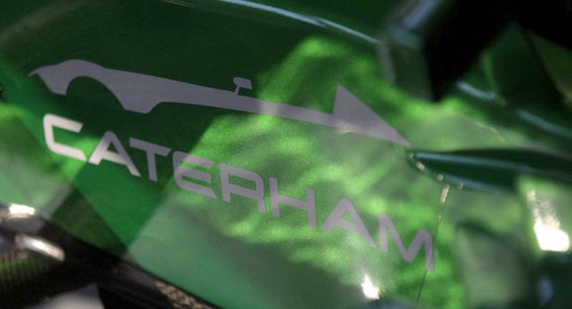  Caterham Teases Upcoming New Sports Model On the Side of Its F1 Cars
