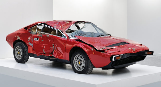  Totaled Ferrari Dino Sells at Contemporary Art Exhibition for $250,000