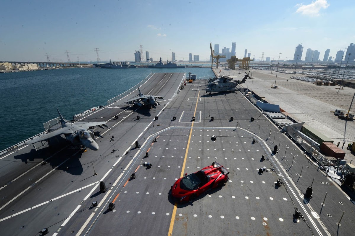 Unveils Veneno Roadster on Aircraft Carrier to People who