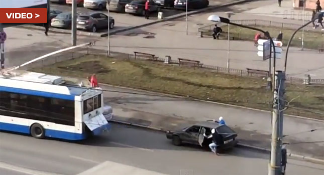  Just Epic: Cheeky Russian Tries to Jump Start Car by Hooking it on Trolley Bus and…Crashes