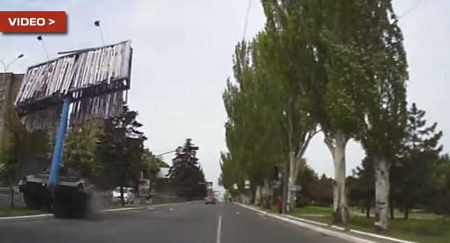  Tank Driver in Ukraine Shows Pure Hatred for Ad Billboard