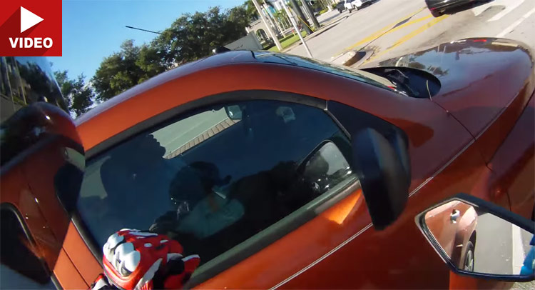  Friendly Biker Gives Driver Who Fell Asleep in the Car a Wake-Up Call