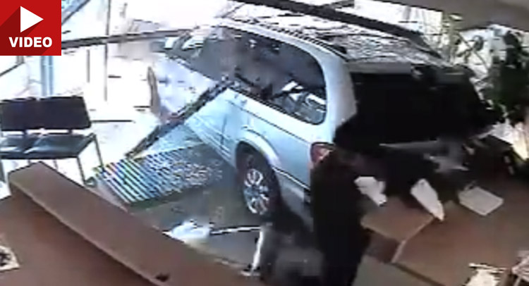  Woman Plows Minivan Into Office Almost Squashing a Customer