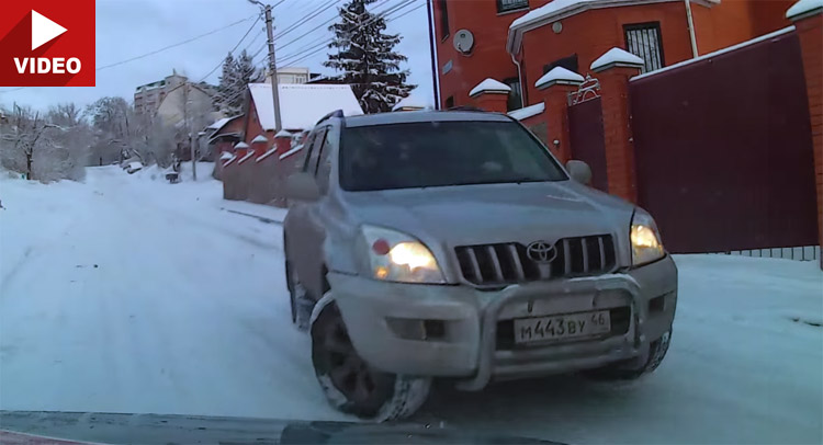  Watch Toyota Land Cruiser Lose Traction and Slide Down an Icy Road