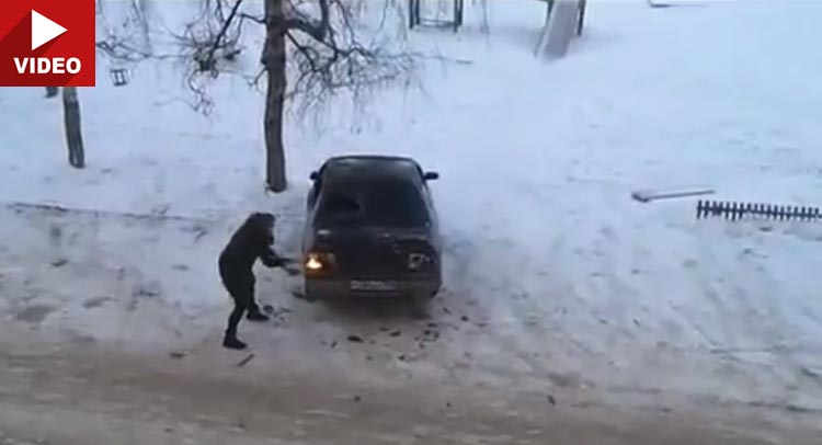  Russian Woman Uses Axe to Destroy Ex-Husband’s Car