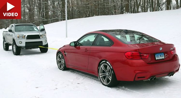  BMW M4 and Toyota Tacoma Caught in a Snow Tug of War
