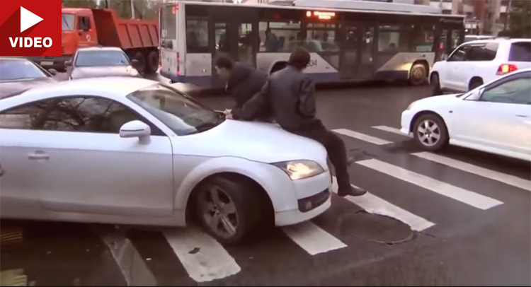  Woman in Audi TT Drives Through Crossing, Takes Off With 2 Men on Hood and Then Kicks Their Ass!