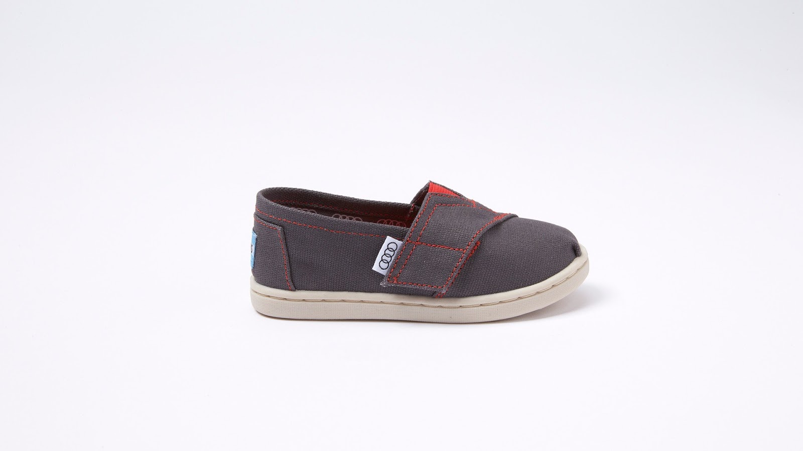 Audi designed a line of shoes with Toms, but you need to buy an Audi to get  them - The Verge
